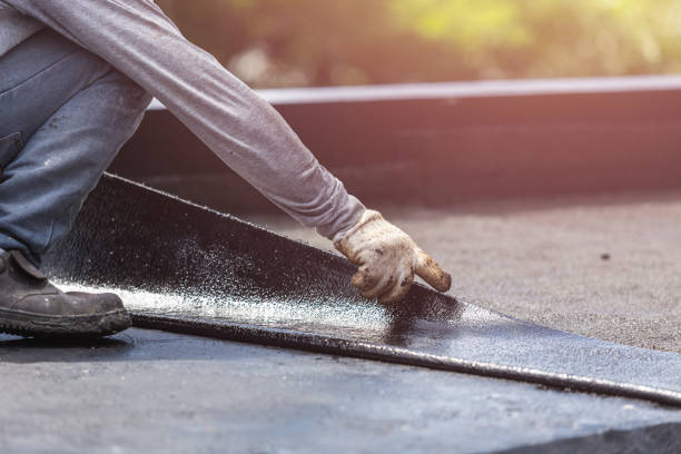 Professional Emergency Waterproofing technician working in Manahawkin, NJ